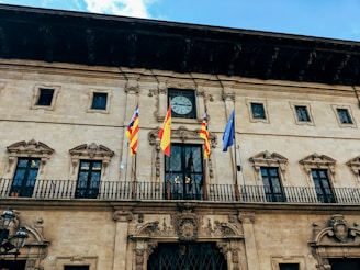 Spain flag in front of building