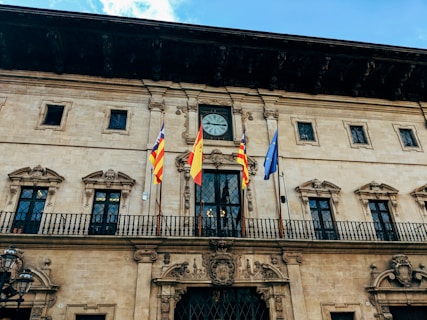 Spain flag in front of building