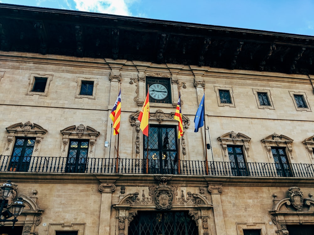 Spain flag in front of building