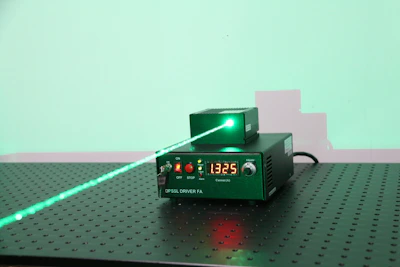 The XTool F1 Ultra double laser system working simultaneously on metal and acrylic.