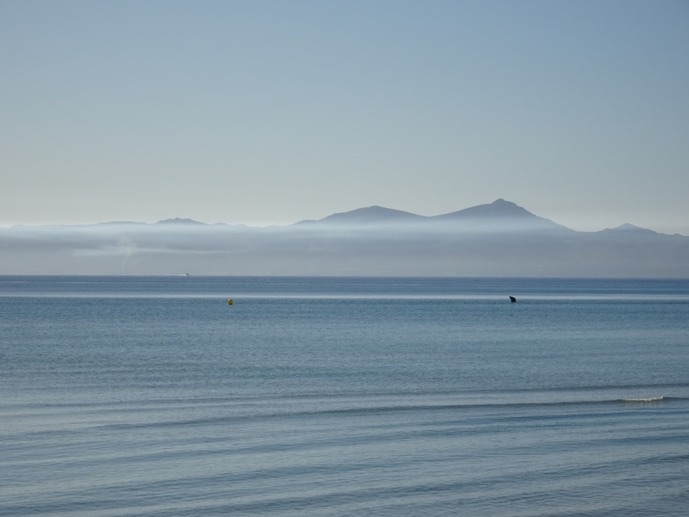 ocean and mountains island during day