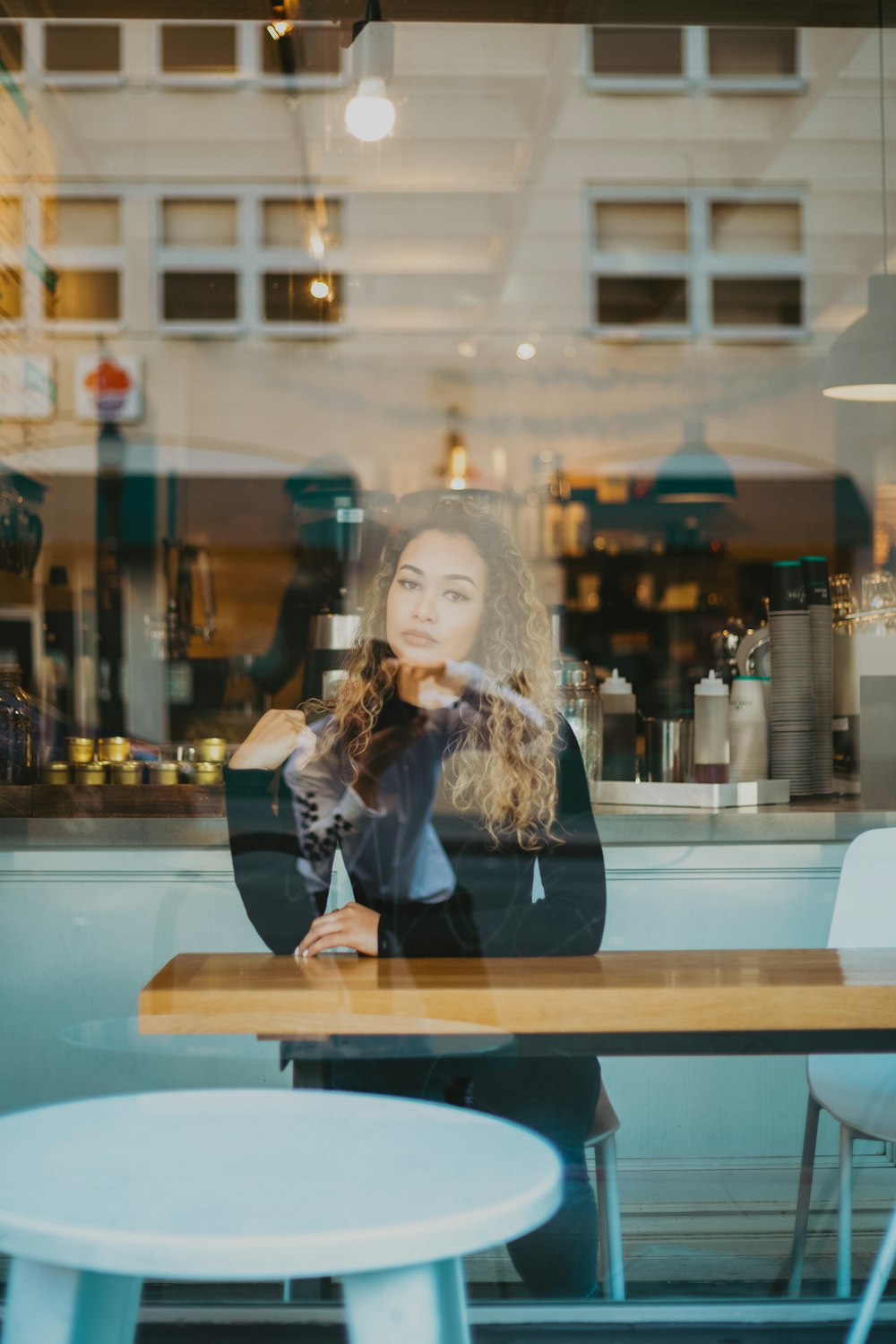 woman sitting at the table