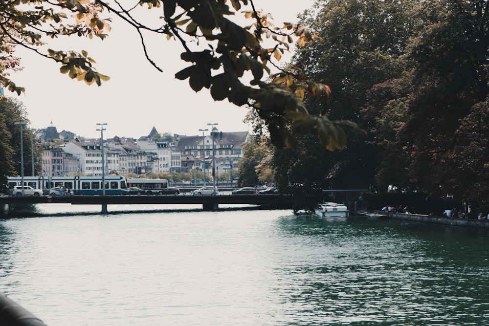 bridge and building facing body of water