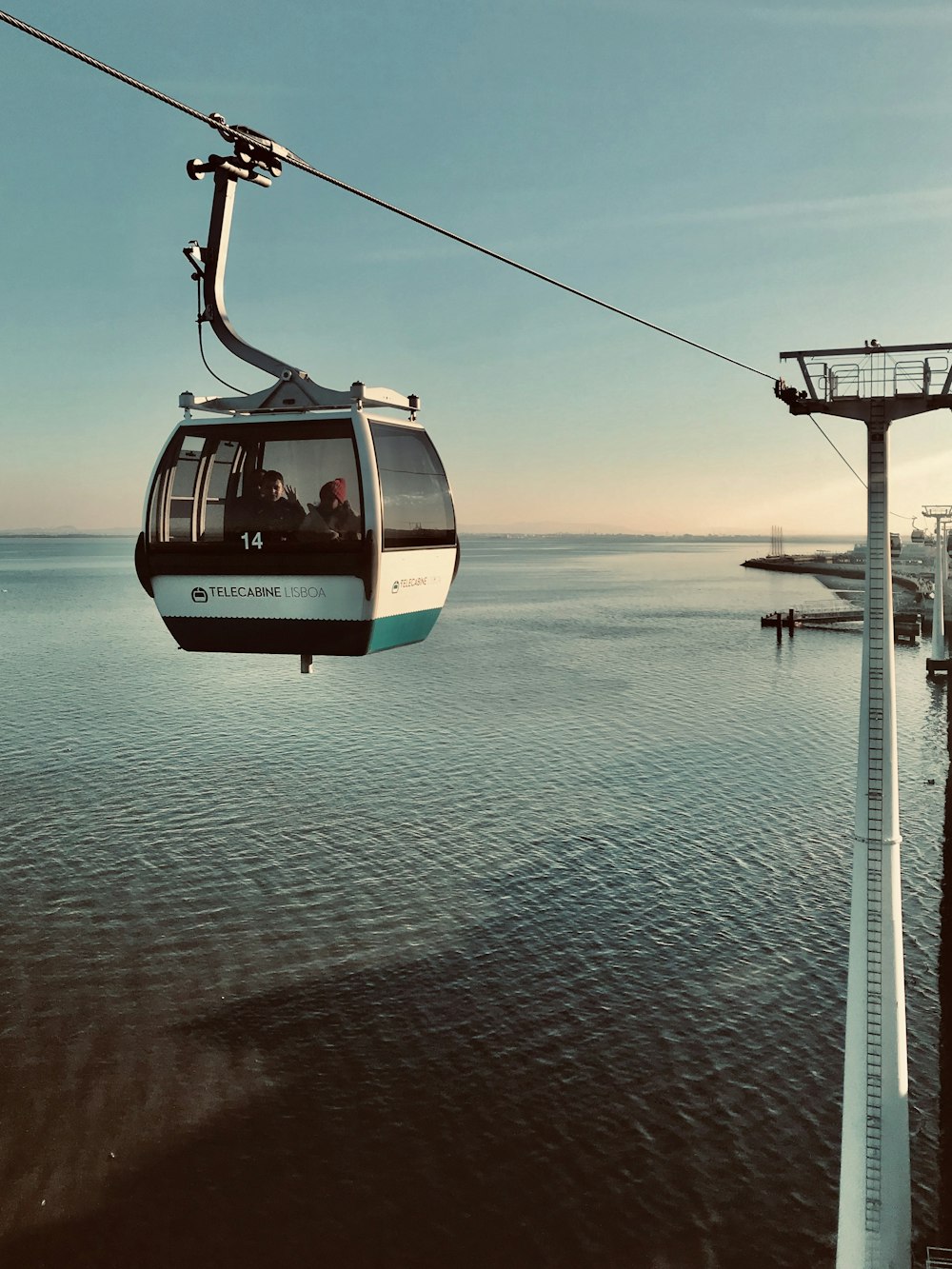 people riding cable car