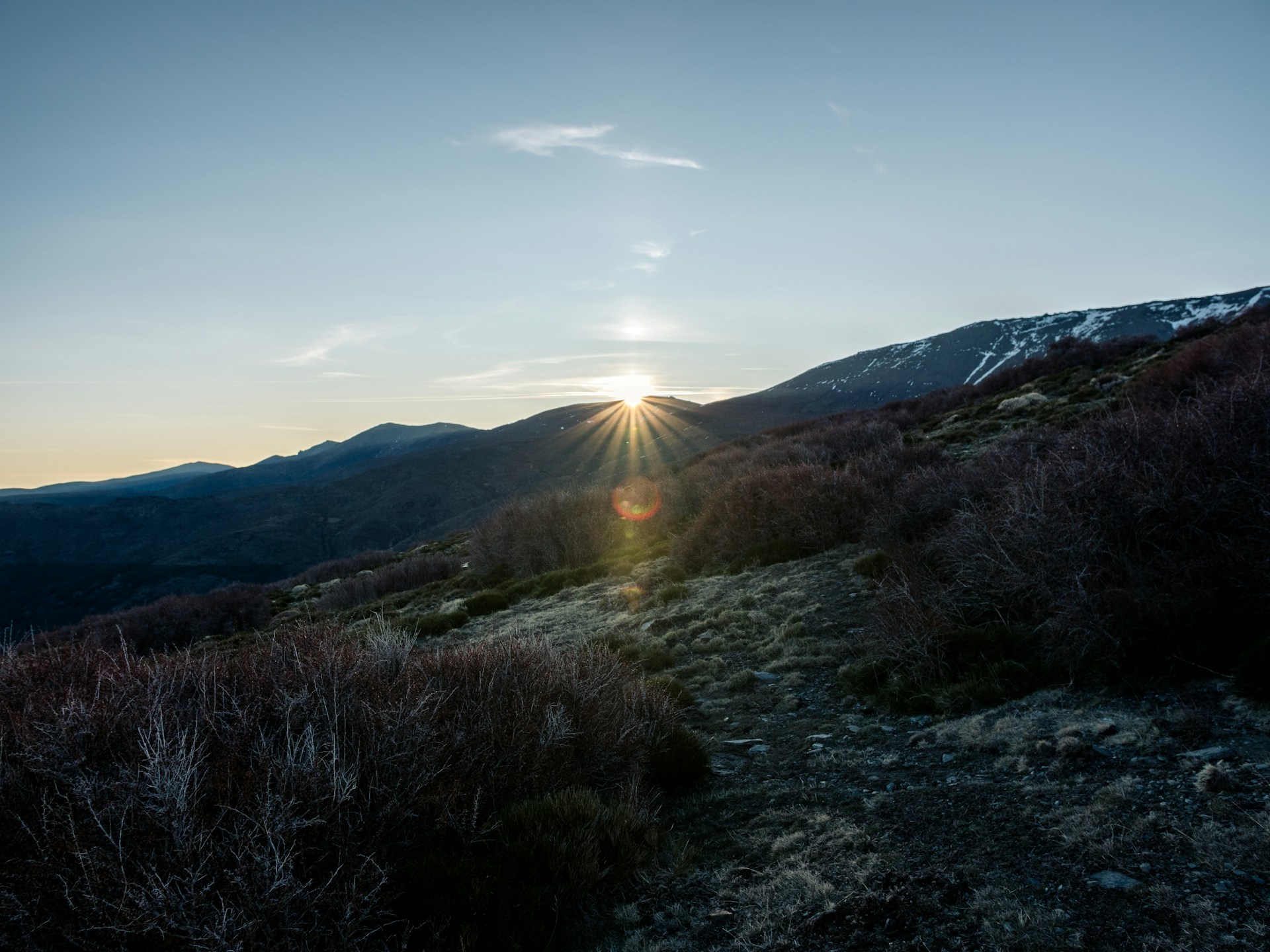 A tranquil sunset over the Himalayan landscape, highlighting the exclusivity and natural beauty of the lyf infra community.