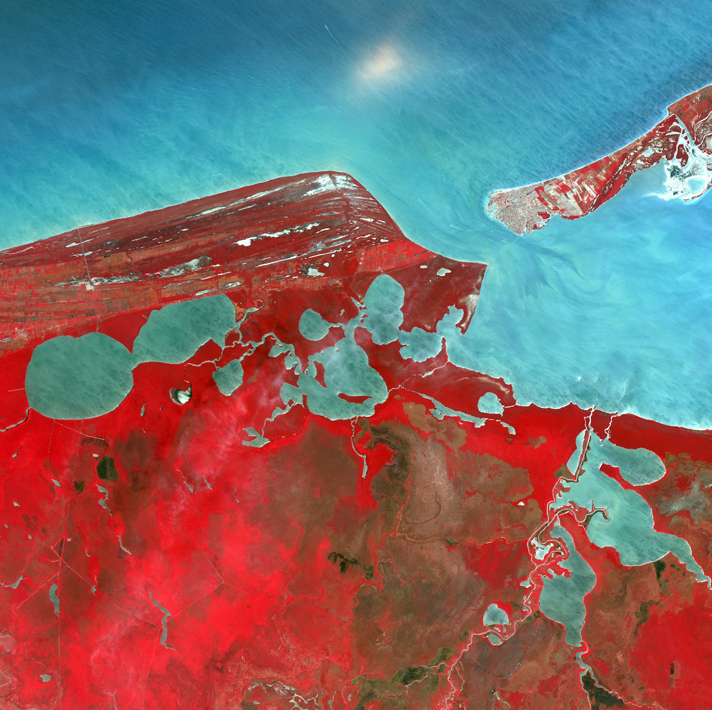 Red and blue aerial imagery of the western half of Mexico's Yucatan Peninsula