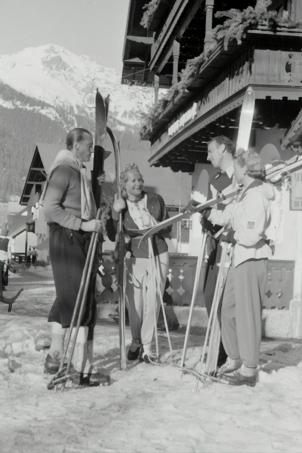 grayscale photography of unknown persons standing outdoors