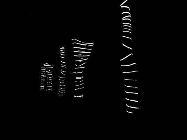 Minimalistic abstract animation of upward growth lines on a dark sleek background.