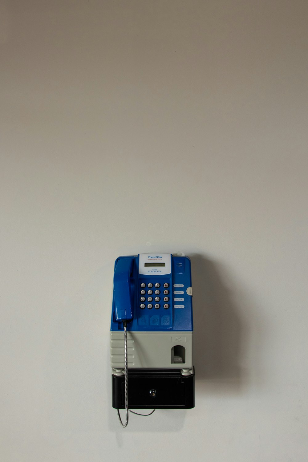 blue and gray telephone