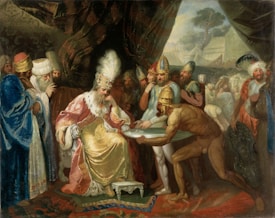 A regal scene features a seated figure in ornate robes and a lavish headdress surrounded by attendants and courtiers. The figures are engaged in various activities, with one standing out as they offer something to the seated figure. The setting is rich and textured, with a canopy of fabric draped above the group and a distant landscape visible in the background.