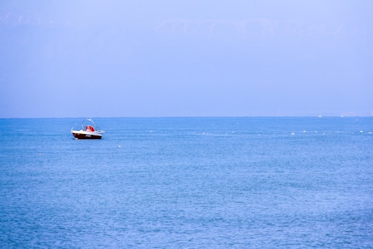 white and brown boat on body of water during daytime in Antalya Turkey