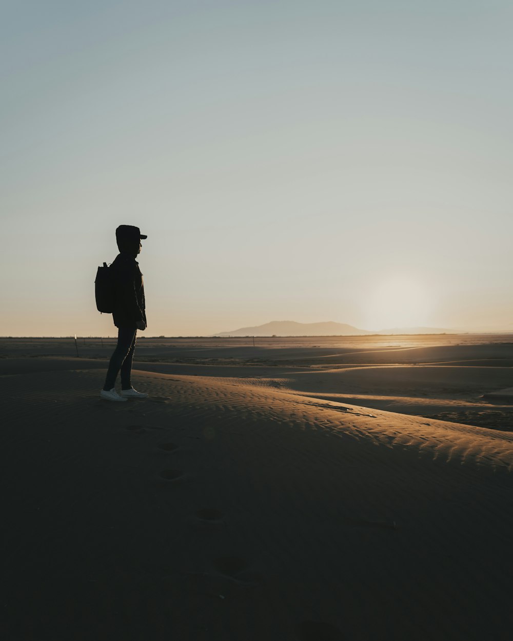 man wearing hooded jacket