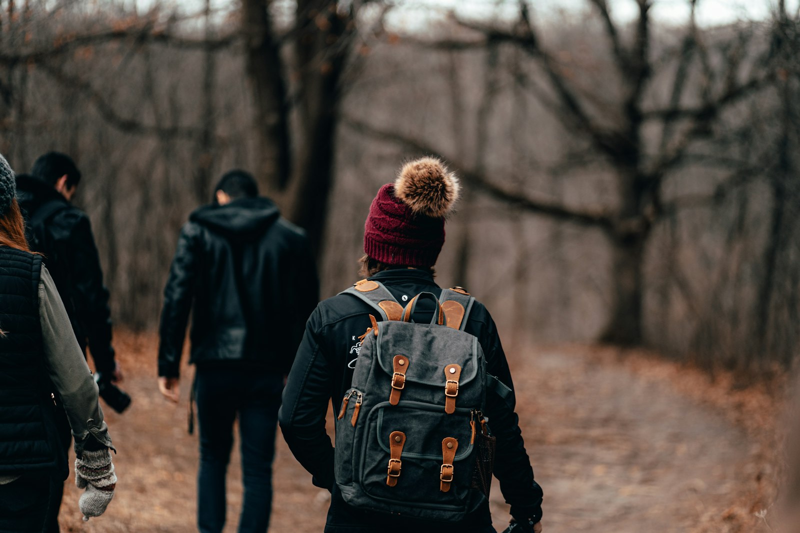 Sony a7 II + Canon EF 85mm F1.8 USM sample photo. People walking in forest photography