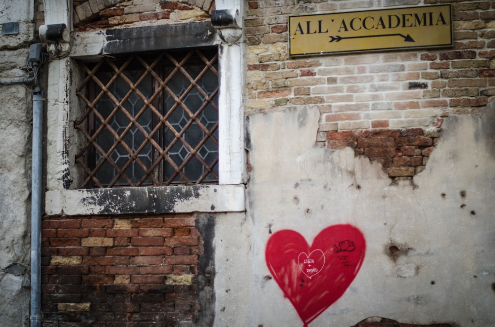 red heart print on wall