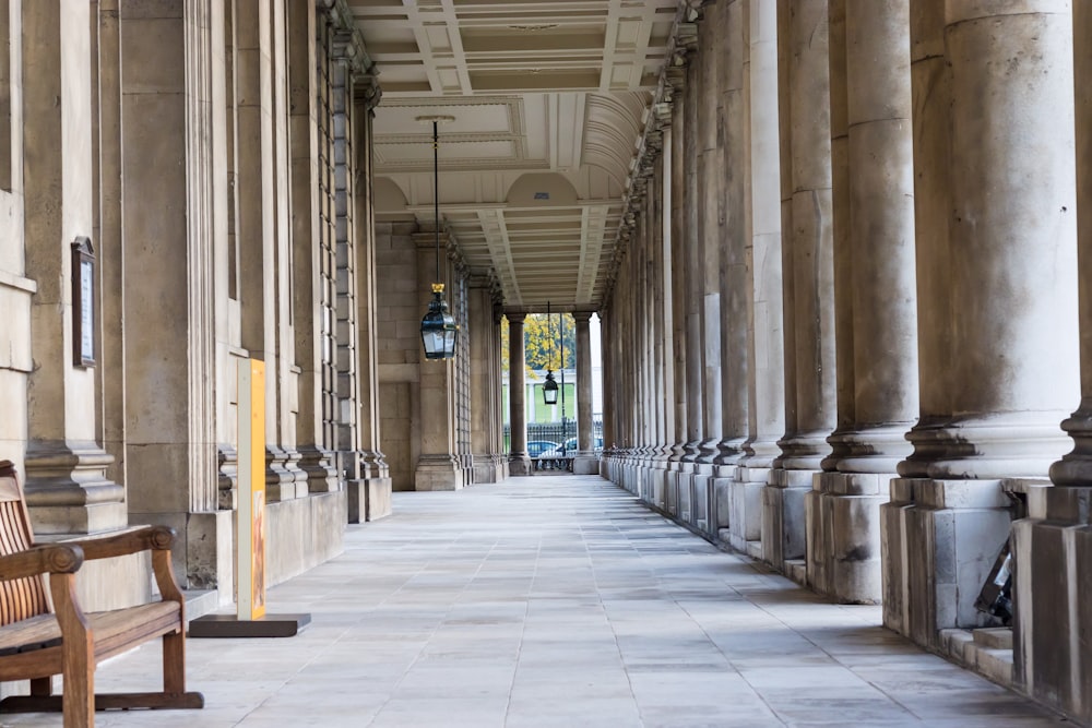 gray concrete hallway during daytime