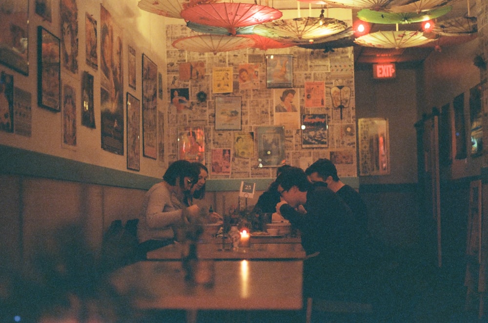 people eating inside eatery