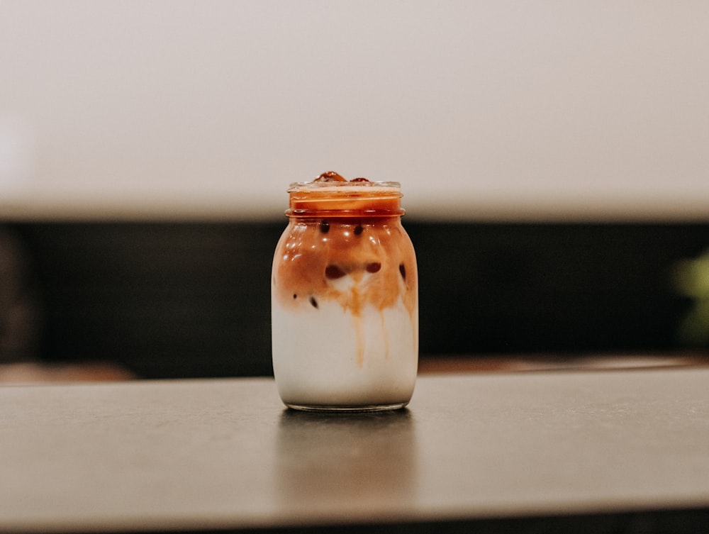 cup of cold beverage on table