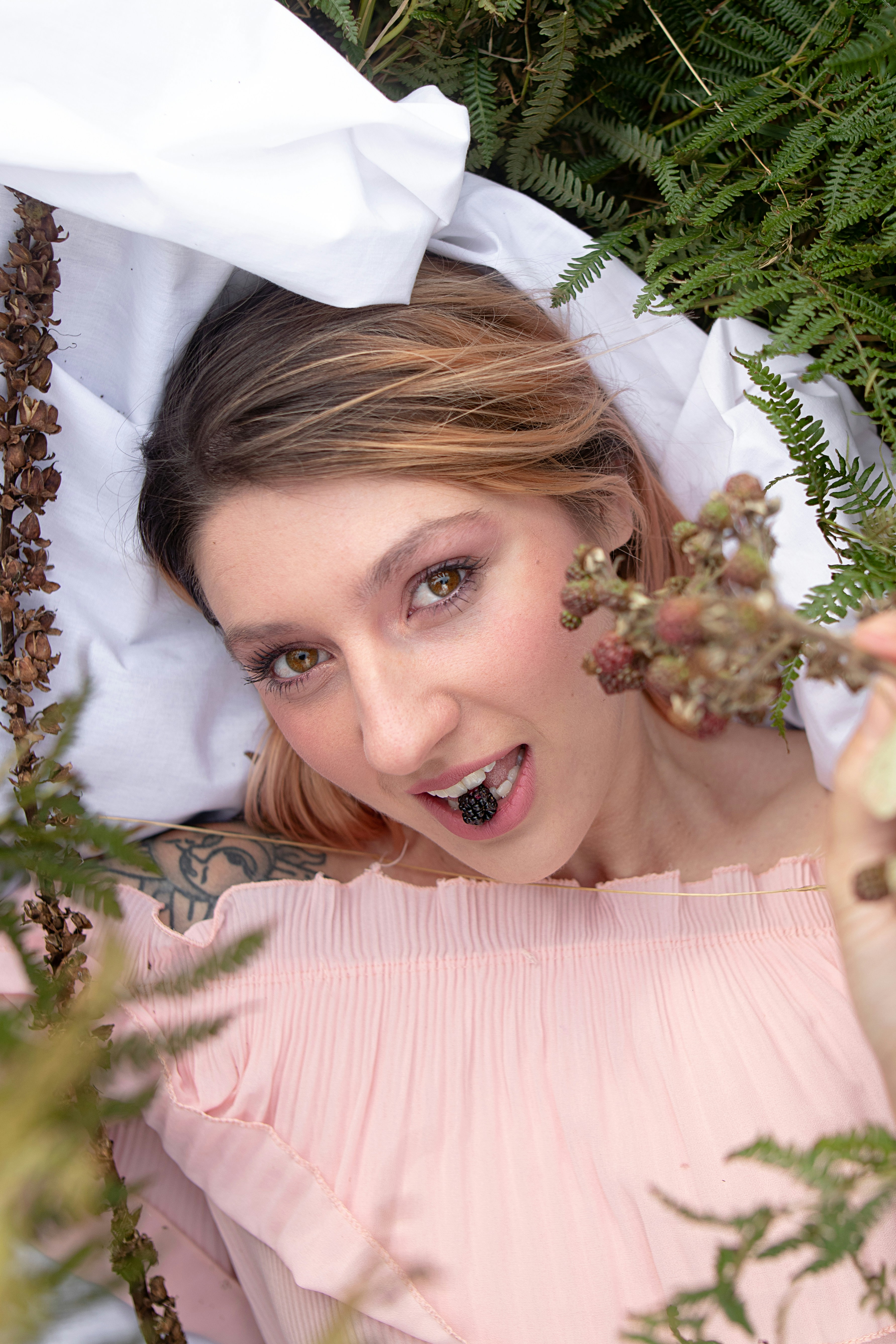 woman wearing pink strapless dress