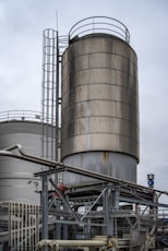 gray industrial factory under white sky