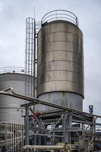 gray industrial factory under white sky