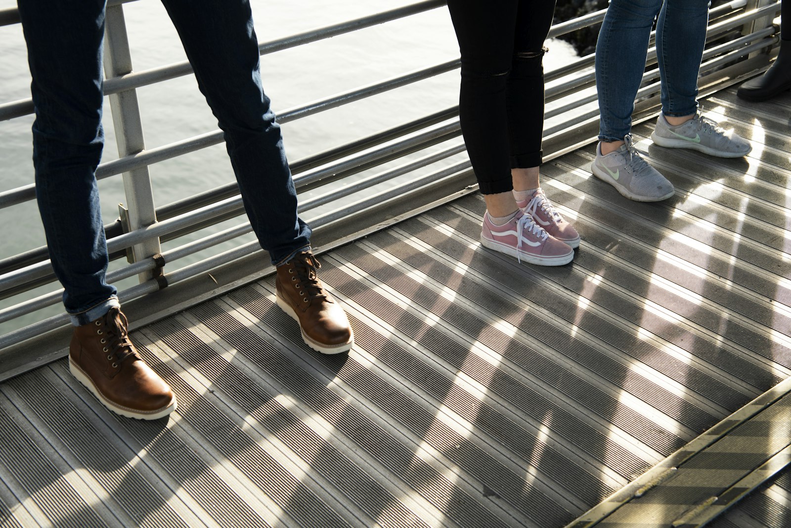 Nikon AF-S Nikkor 24-70mm F2.8E ED VR sample photo. Three people wearing shoes photography