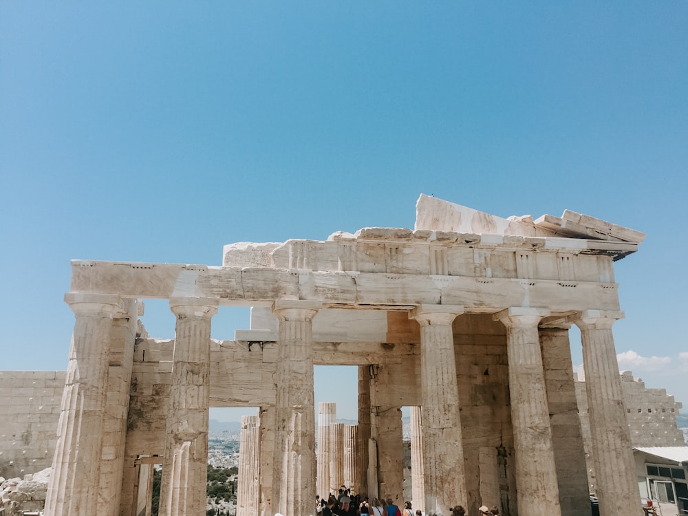 brown pillared building ruins during daytime