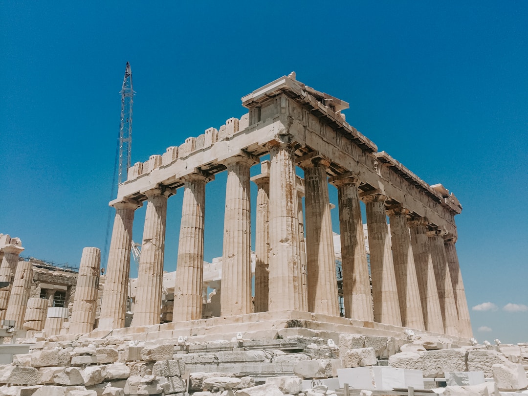Athens - The ancient Parthenon temple on the Acropolis under a bright blue Athenian sky.