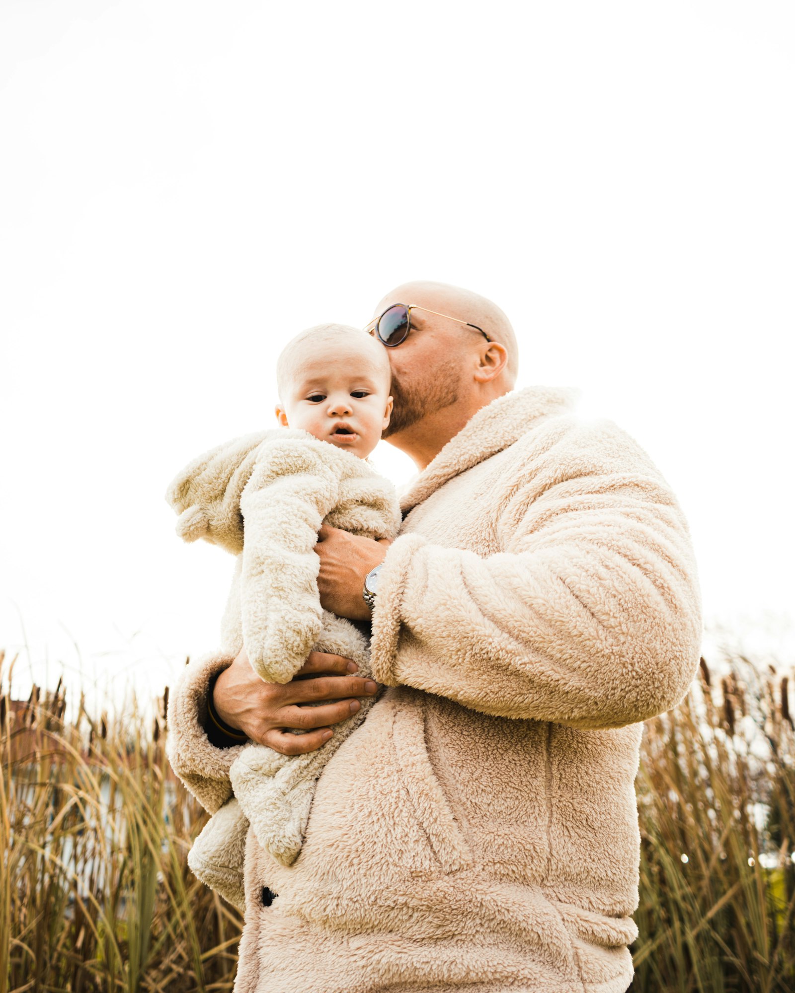 Sony a7R II + Sony FE 28-70mm F3.5-5.6 OSS sample photo. Man holding toddler photography