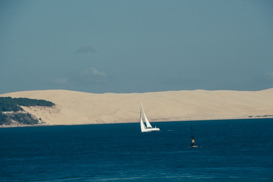 boat on body of water in Dune du Pilat France
