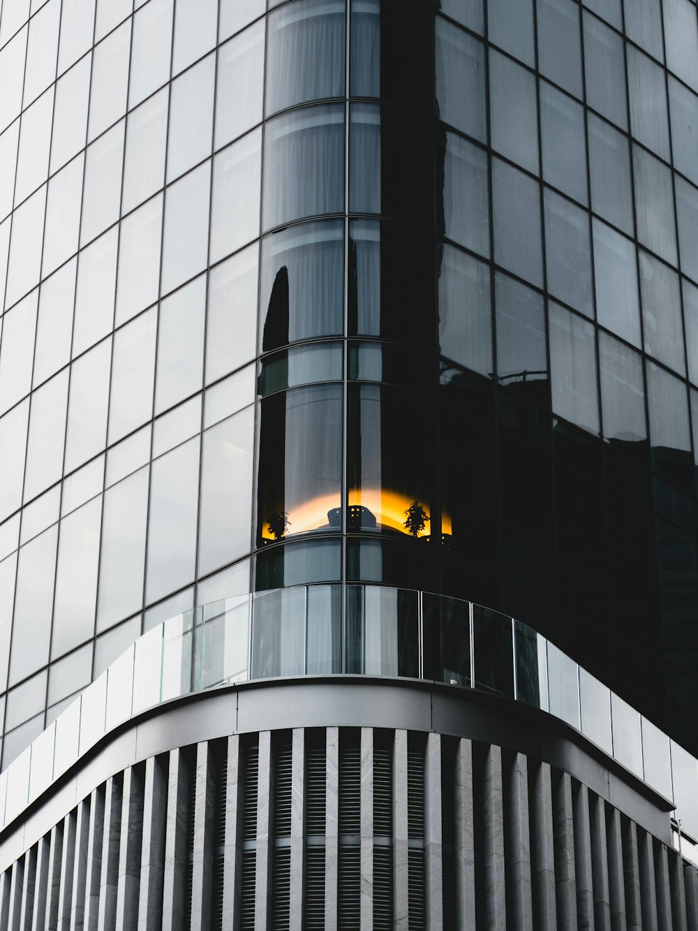 black glass building during day