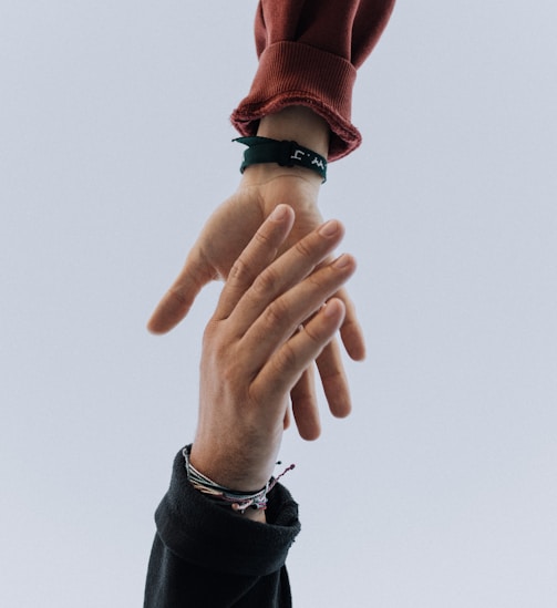 view of two persons hands