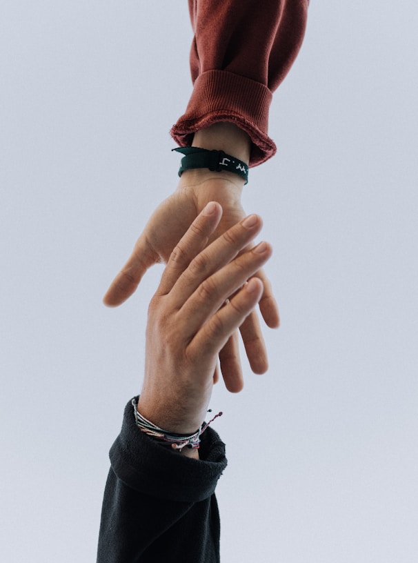 view of two persons hands