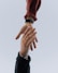 view of two persons hands