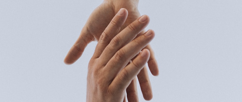 view of two persons hands