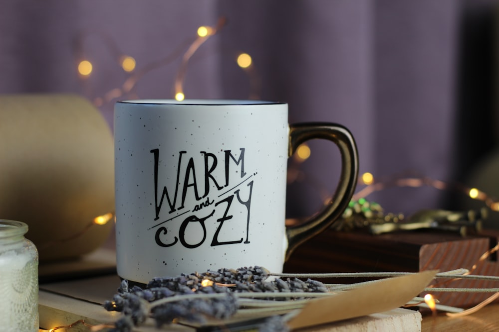 white Warm and Cozy printed ceramic mug