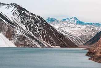 photography of snow-capped mountain range during daytime