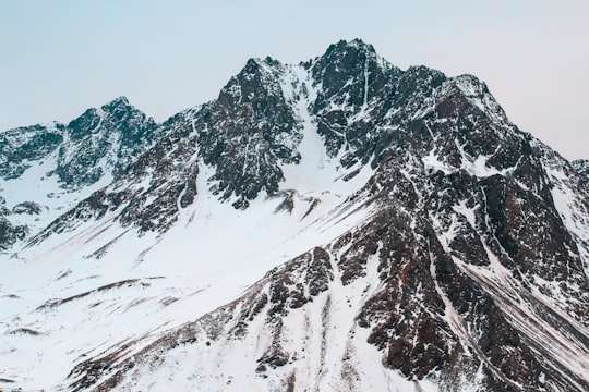 glacier mountain during day in Embalse el Yeso Chile