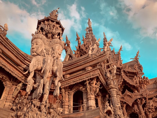 brown concrete Buddha temple in Sanctuary Of Truth Thailand