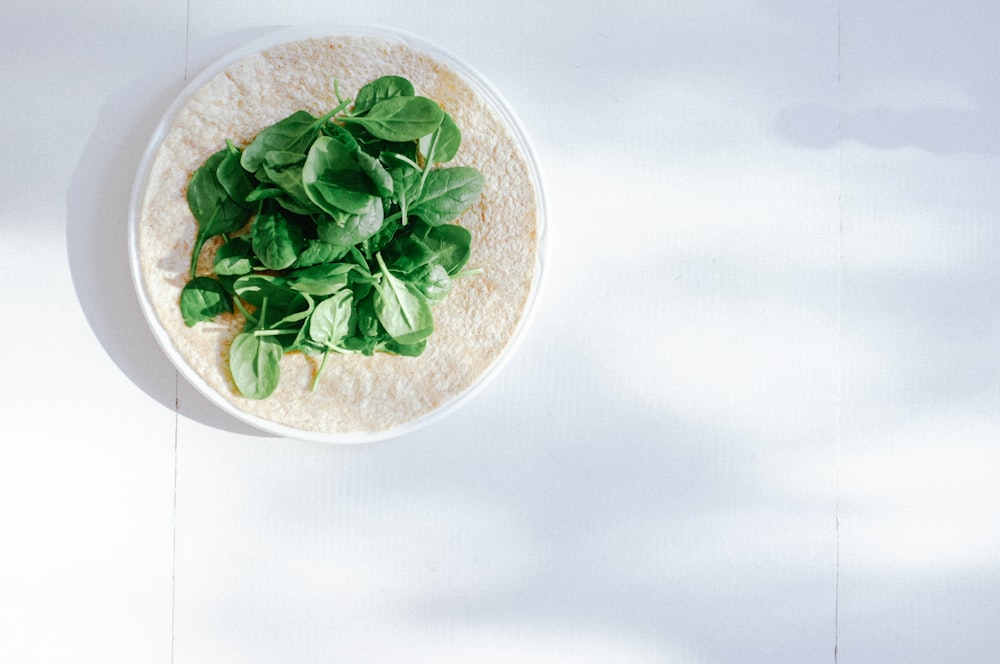 green vegetable leaves on plate