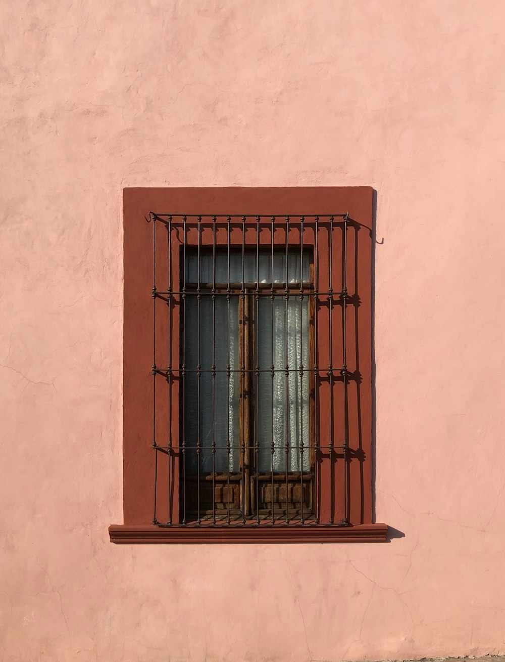 closed brown wooden window