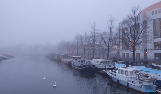 boats beside structures in Jodenbuurt Netherlands