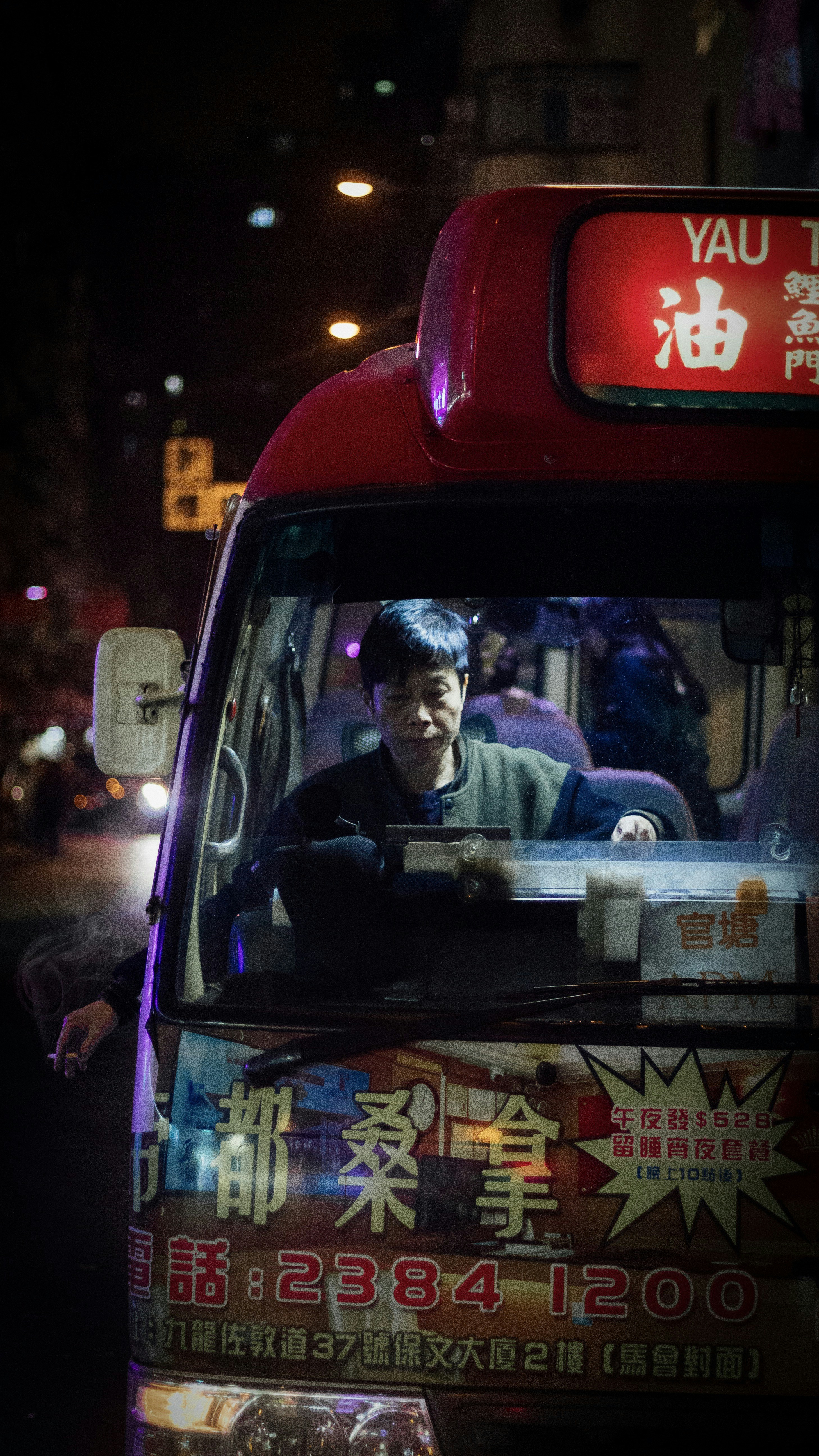 man-sitting-inside-bus-at-night-photo-free-mong-kok-image-on-unsplash