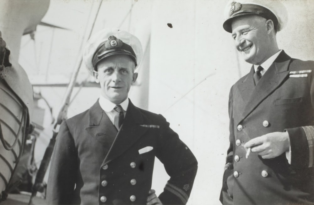 two man wearing uniform