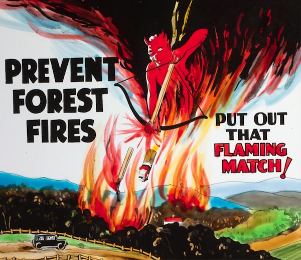 A 1940s advertisment showing a devil in the sky shooting a lit match and cigarette but at a forest, causing flames