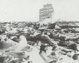A large sailing ship navigates through a vast expanse of ice-covered waters. The scene is dominated by heavy ice floes and large masses of snow. The ship's tall masts and white sails contrast starkly with the surrounding icy landscape.