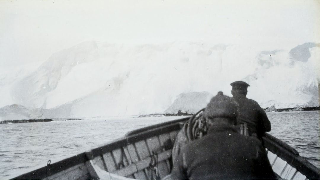man riding boat, Lantern Slide - Motor Boat Party of Explorers, BANZARE Voyage 2, Antarctica, 1930-31<p></figure>Photographer: Eric Douglas