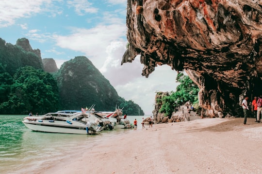 boats on shore in Ao Phang-nga National Park Thailand