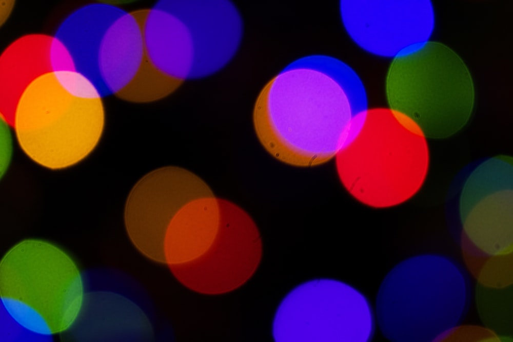 a blurry photo of colorful lights in the dark