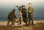 Men of Fort Story operate an azimuth instrument, to measure the angle of splash in sea-target practice, Fort Story, Va