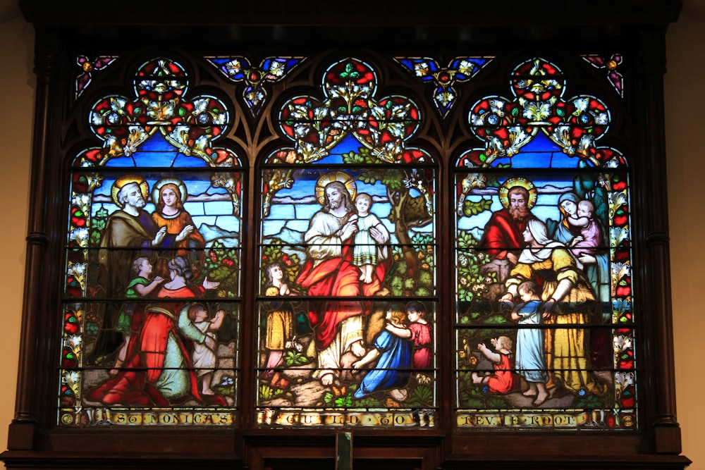 a stained glass window depicting the birth of jesus